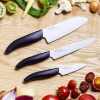 Picture of Revolution 3 Piece Ceramic Knife Set - 6" Chef's, 5" Micro Serrated Tomato and 3" Paring -Black/White